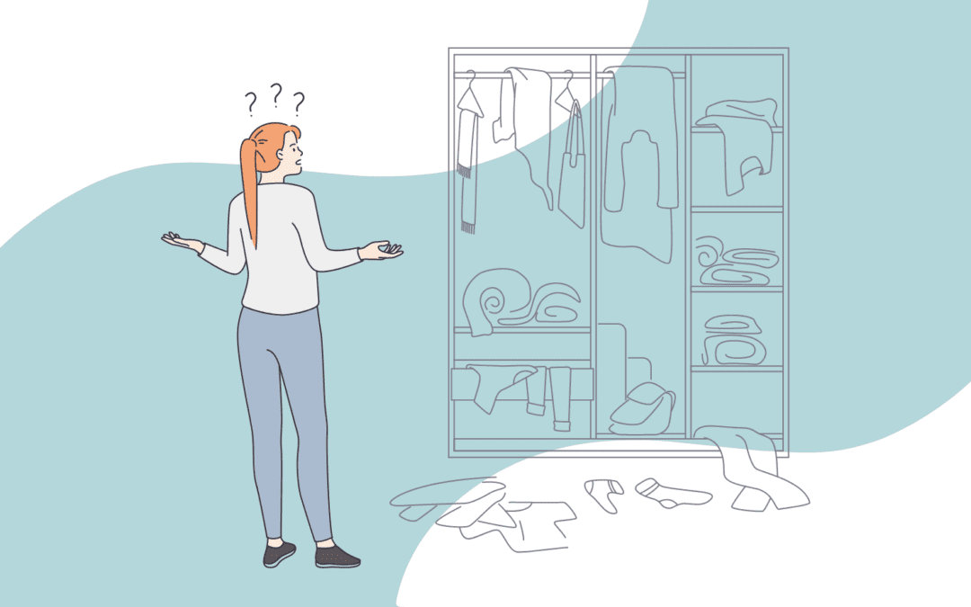 woman staring at a messy wardrobe with clothes hanging out